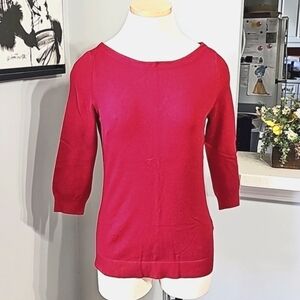 White house black market red pull over sweater. 3/4 sleeves. Size small Key hole